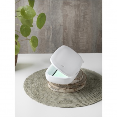 Logotrade promotional product picture of: Capsule UV smartphone sanitizer with 5W wireless charging pad