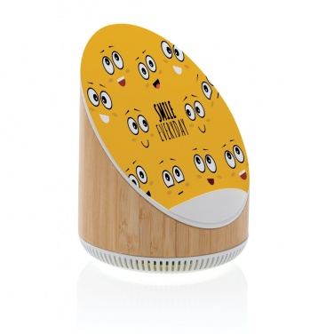 Logotrade promotional gift image of: Ovate bamboo 5W speaker with 15W wireless charger