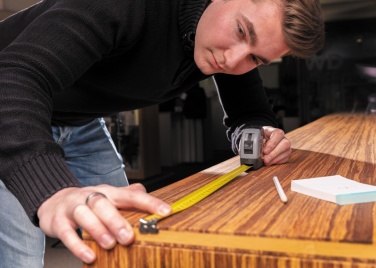 Logo trade firmakingitused foto: Karabiiniga mõõdulint