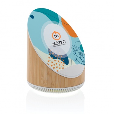 Logotrade ärikingi foto: Ovate bambusest 5W kõlar koos 15W juhtmevaba laadijaga