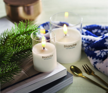 Logotrade meene foto: LED vahaküünal klaasihoidjas